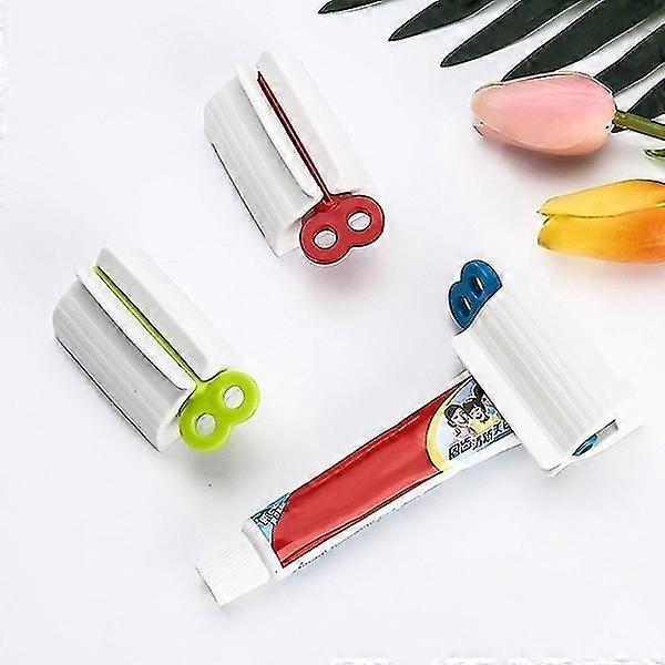 New Rolling Tube Toothpaste Squeezer Toothpaste Holder Rotating Bathroom Toothpaste Dispenser Toothpaste Squeezer-blue