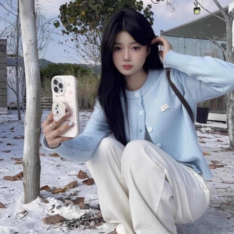 Long sleeved knitted cardigan for women's autumn and winter versatile short style westernized light blue sweater top