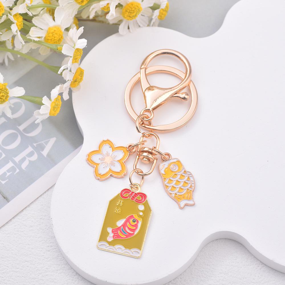 Japanese Sakura Koi Omamori Amulet Keychain for Luck, Wealth & Safety - Charming Couple's Accessory