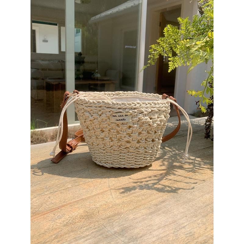 Niche woven bag women's summer new leisure vacation style straw woven bag beach bag mini portable shoulder messenger bag