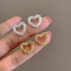 Silver Plated Hollow Heart Cubic Zirconia Stud Earrings