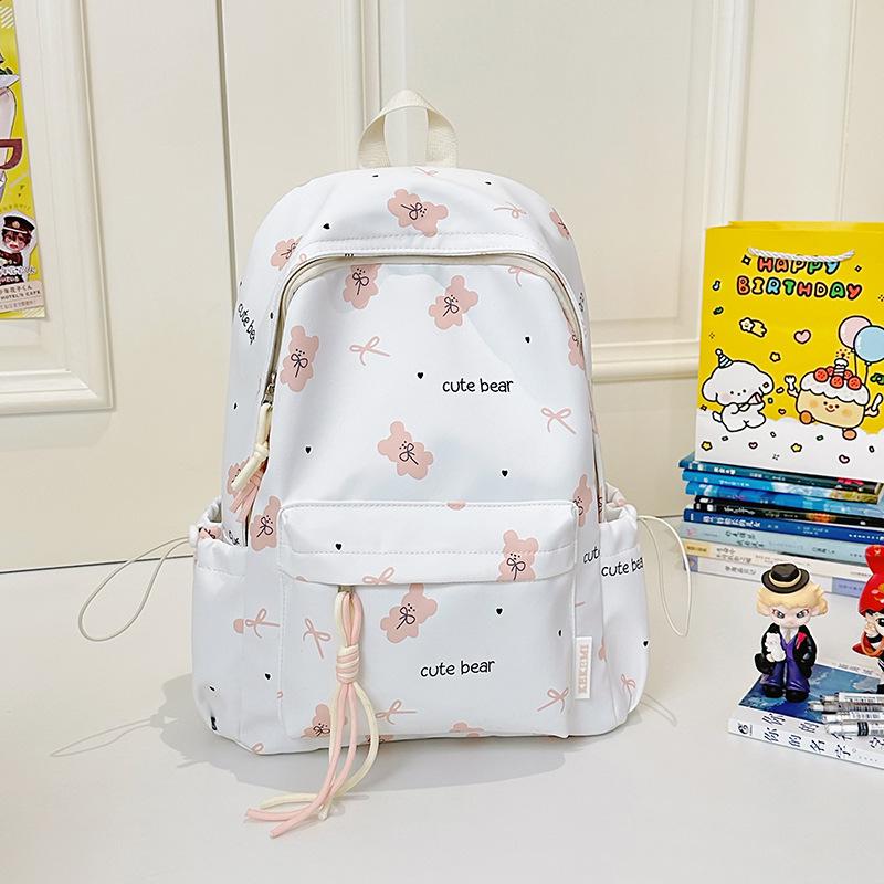 School bag female Korean version printing junior high school large capacity student backpack campus small fresh Mori simple backpack light