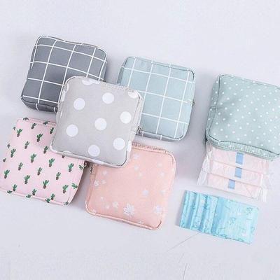 Borsa portaoggetti per assorbente assorbente portatile da donna Borsa portaoggetti per trucco da viaggio in cotone Portamonete con cerniera letteraria Portaoggetti per articoli vari