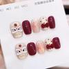 Awakening Lion Festive Whitening Nail Art Tips with Red Velvet Bow