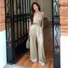 2026 Spring/Summer Sleeveless V-neck Halter Jumpsuit for Women - Tie-up Waist, Wide-leg Long Pants, Elegant and Loose Fit.