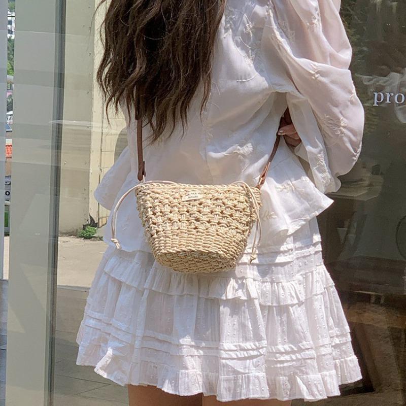 Niche woven bag women's summer new leisure vacation style straw woven bag beach bag mini portable shoulder messenger bag
