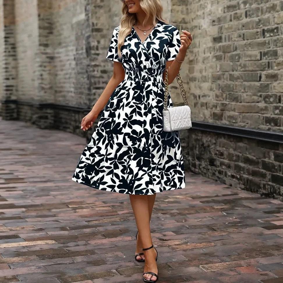 2026 spring and summer short-sleeved V-neck leaf print big swing skirt waist dress fairy skirt