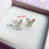 Boucles d'oreilles tendance papillon pour femmes Émail noir Petit cristal Papillon creux en forme d'animal creux Boucles d'oreilles pendantes pour femme