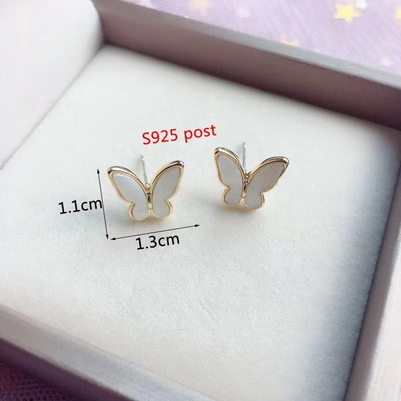 Boucles d'oreilles tendance papillon pour femmes Émail noir Petit cristal Papillon creux en forme d'animal creux Boucles d'oreilles pendantes pour femme