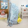 Star Print Backpack with Front Pocket and Side Drawstring Pockets for School and Casual Use