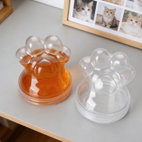Pfotenform Aufbewahrungsflasche Klare Katzenhaare Andenkenflasche Kunststoff Haustierhaare Aufbewahrungsflasche mit Deckel Gedenk-Andenkenbox Behälter für Bastelzubehör