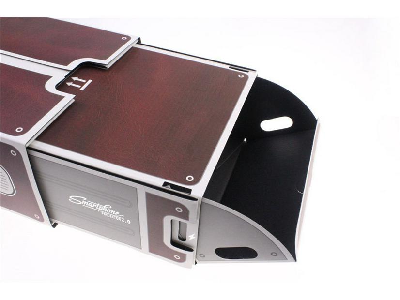 Smarttelefonprojektor 2.0: Andre generasjon, trenger ikke strøm, enkel installasjon, kompakt.