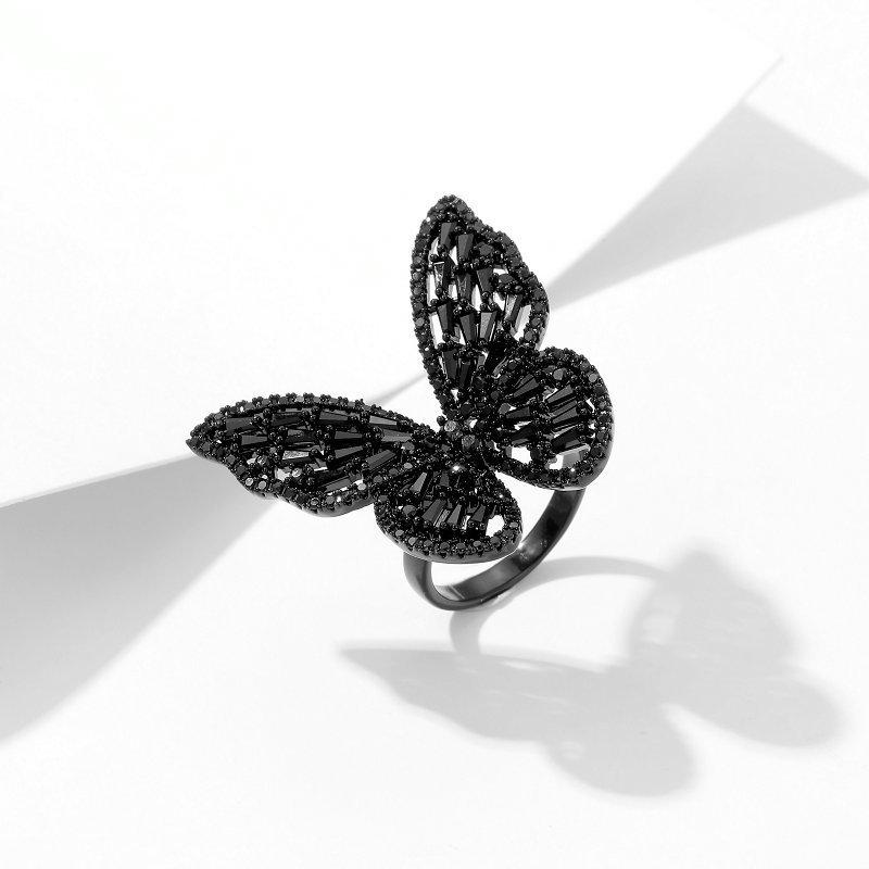 

Новий модний нішевий темперамент дизайнер супер фея темперамент відкритий вказівний палець кільце метелик кільце сережки гвоздики комплект ювелірних виробів