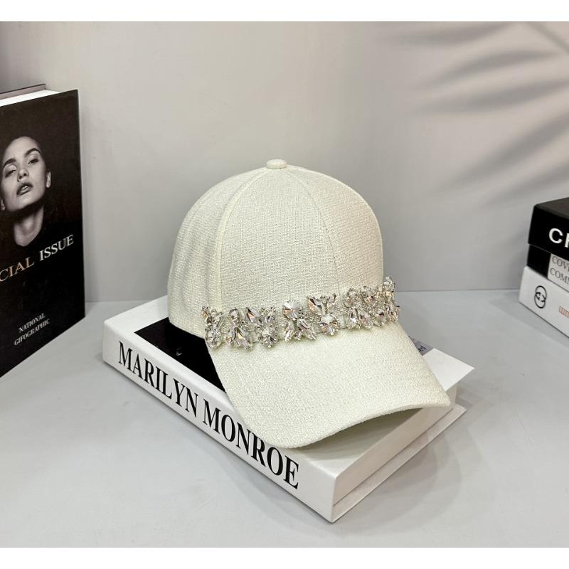Black hat female trendy brand rhinestone baseball cap showing a small face solid color hard top cap sun protection large brim