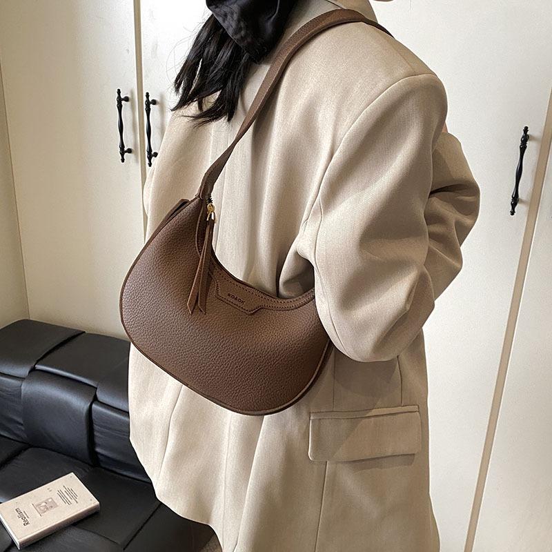 This year, the popular crescent moon dumpling bag women's bag 2025 new fashion light luxury niche high-end single shoulder messenger bag