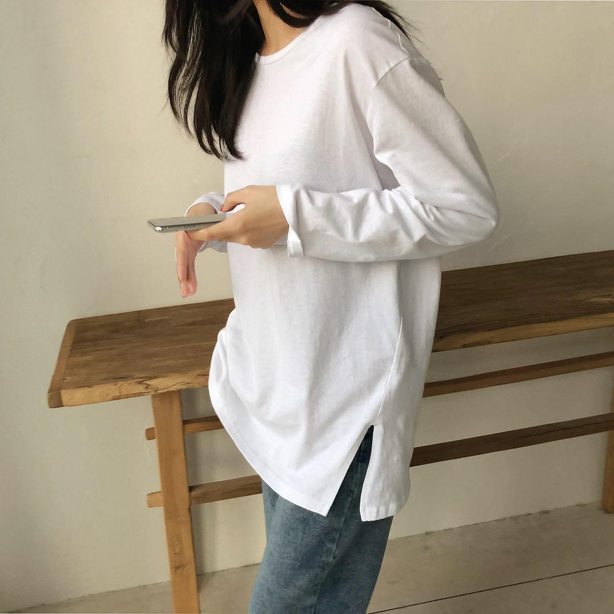 

Женская футболка со свободным низом, длинными рукавами и верхом с разрезом внутри