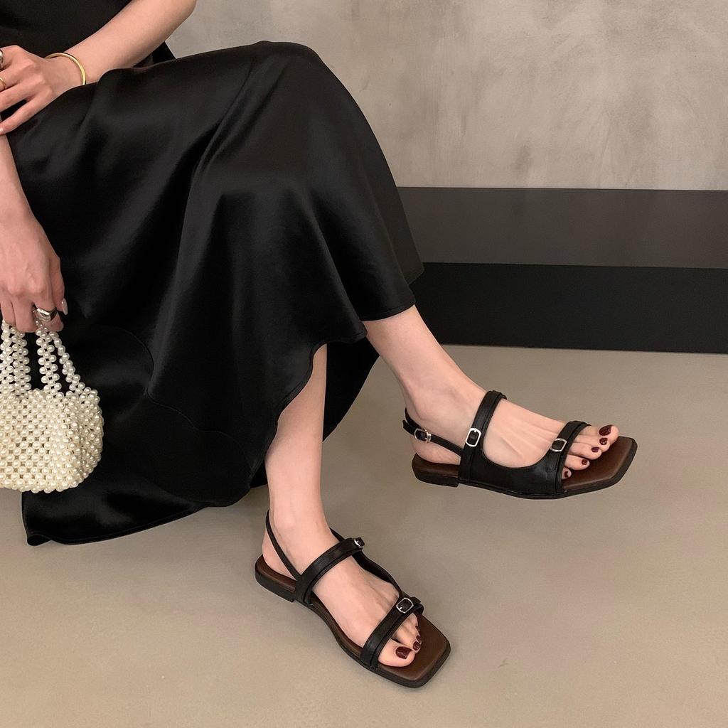 Design Sense One Word Belt Buckle Flat Roman Sandals Women's 2025 Summer New Seaside Vacation with Skirt Beach Shoes