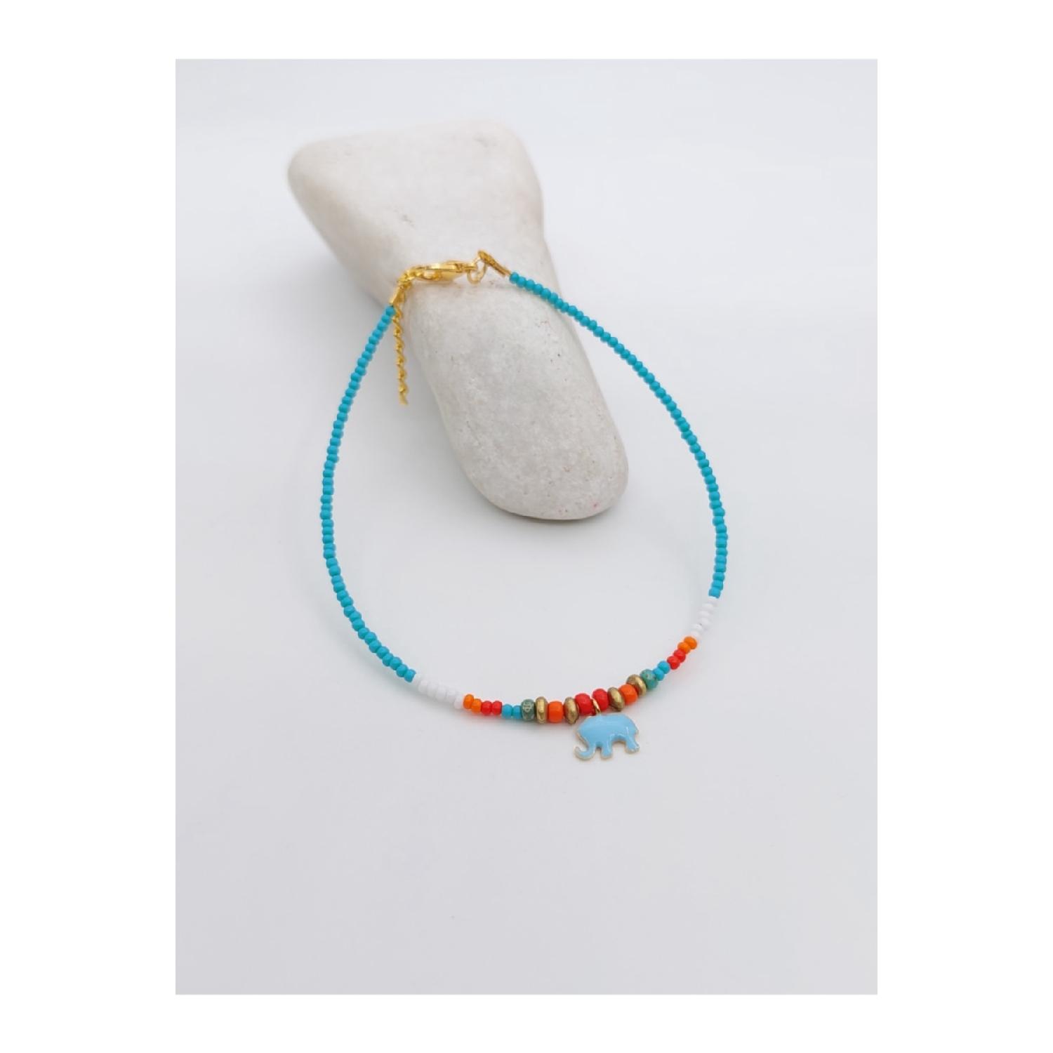 

Подлинная женщина с эмалью в виде слона