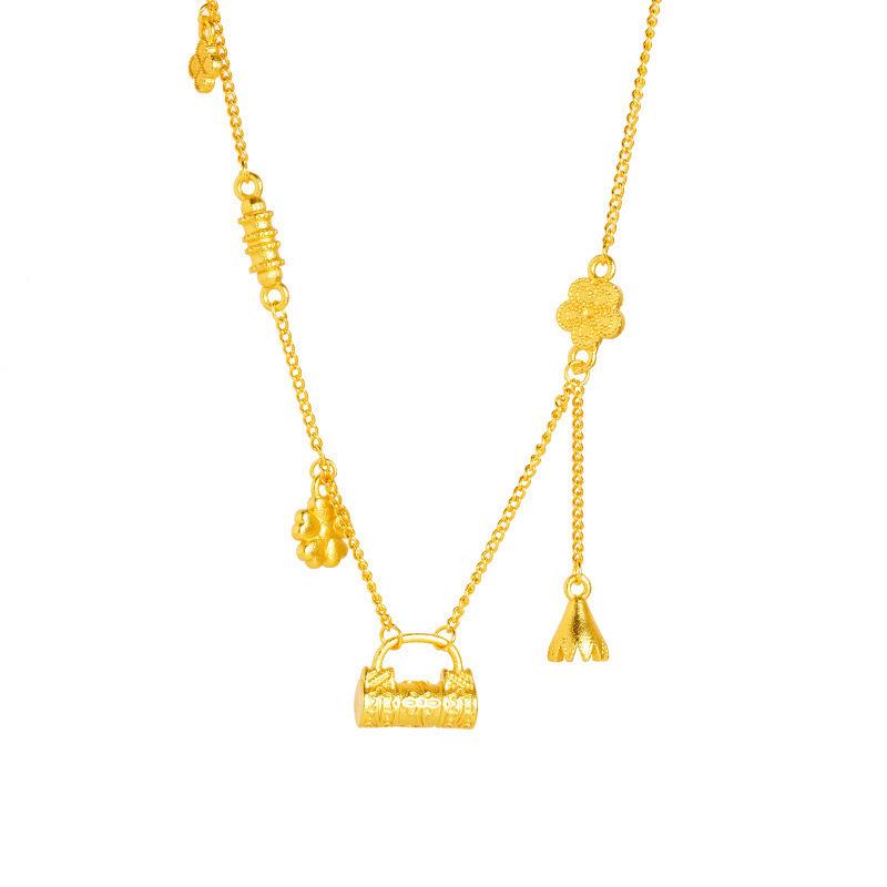 Exquisite Sparkling Sand Gold Four-Leaf Clover Tassel Necklace – Ethnic Style, Long-Lasting Color, High-End Feel