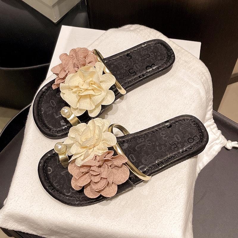 2025 summer new open-toed flower casual beach women's cool slippers low-heeled flat bottom women's high-end sense