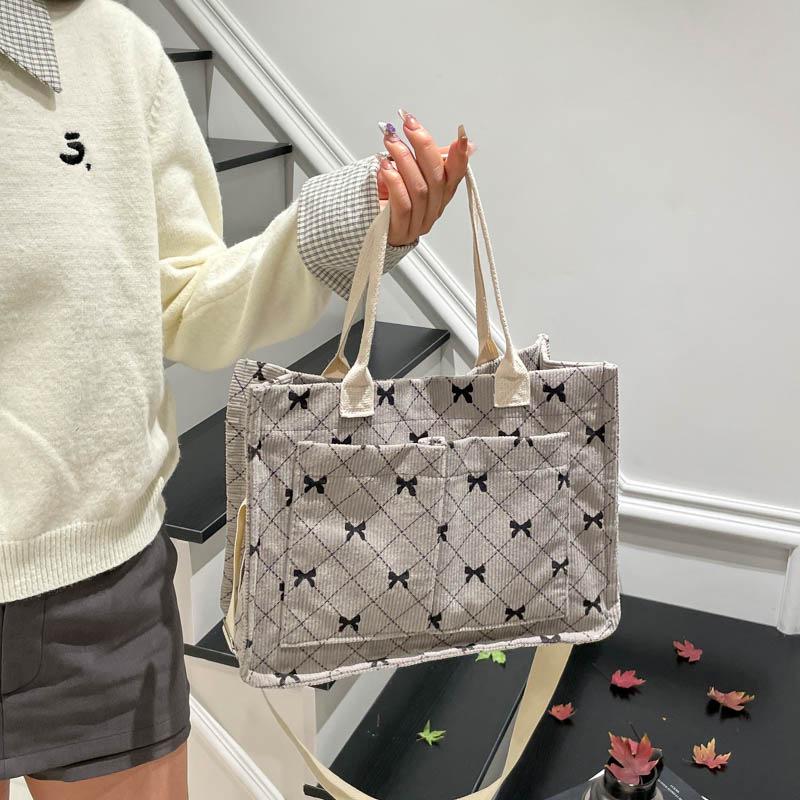 

Autumn/Winter Corduroy Bow Tote: Large Capacity, Multi-Pocket Fashion Handbag for Shopping and Casual Use. серый