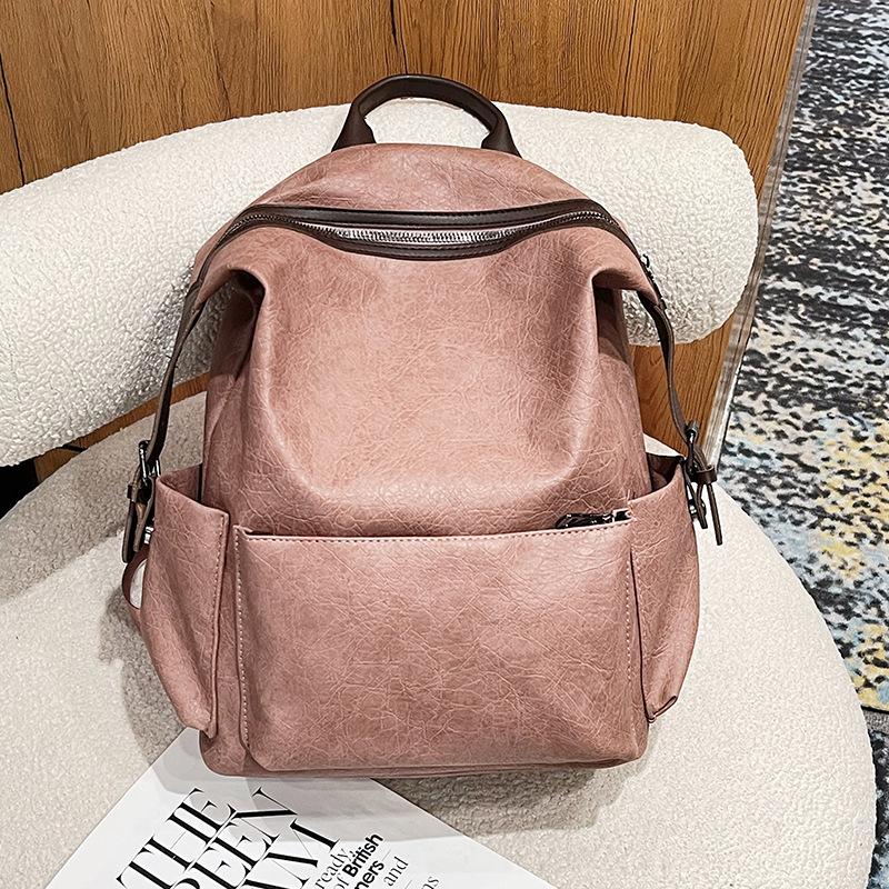 

Жіночий рюкзак в стилі ретро нової моделі, місткий простий студентський ранець, багатоцільова модна жіноча сумка з ПУ рожевий