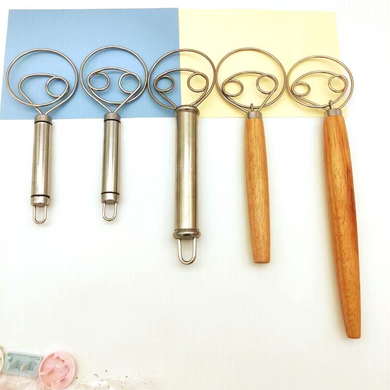 Ergonomic Handheld Egg Whisk for Kitchen Baking Multi Function Dough and Sauce Mixing Tool for Home Restaurants and Bakeries