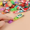10-30Pcs Christmas Pop Keychains Fidget Stress Relief Toys Cartoon Santa Claus Snowman Kids Christmas Party Favors New Year Gift