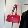 Large capacity bag women's autumn and winter retro 2025 new niche design shoulder handbag oilskin bag