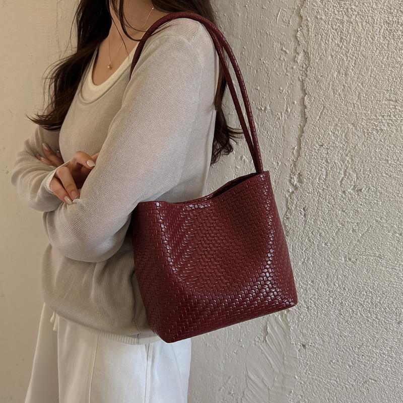 Damen gewebte PU-Eimertasche Minimalistische Umhänge-Handtasche für den täglichen lässigen Einkauf
