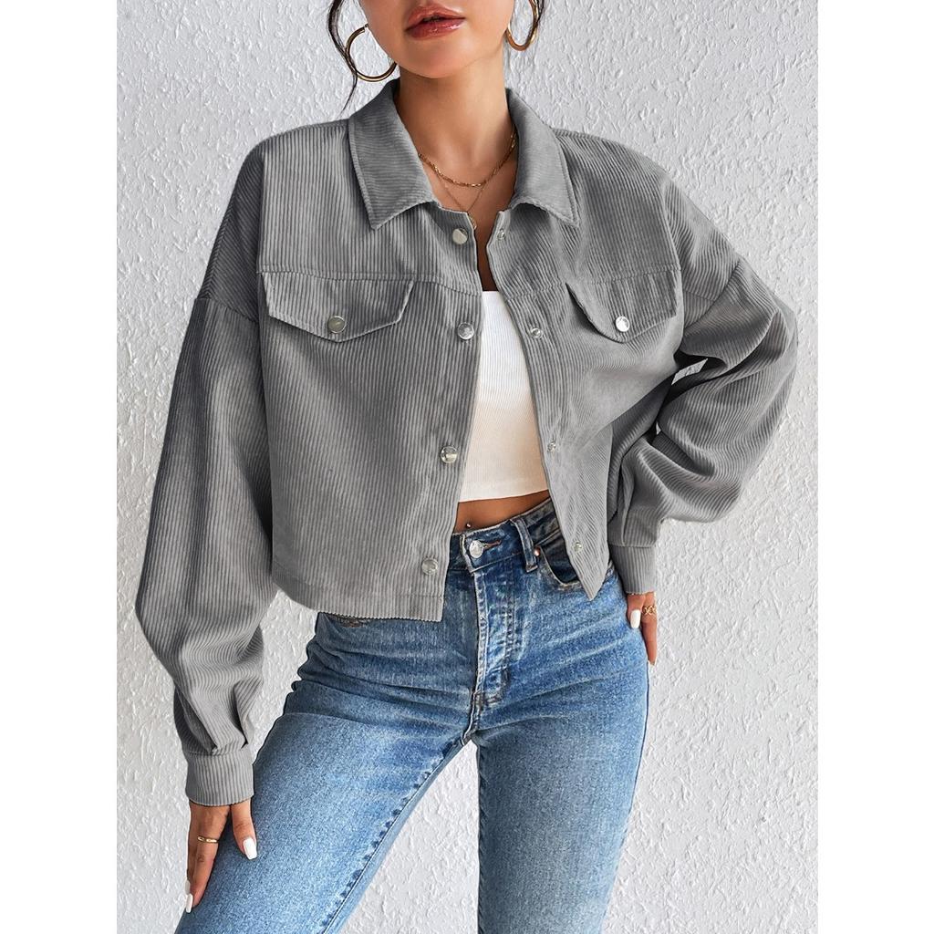 Temperamentní úzký krátký kardigan na zip s klopou a manšestrovou bundou