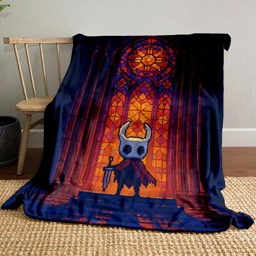 A vibrant stained glass window pattern with warm hues dominates the scene. for all seasons blanket lunch break throw gift