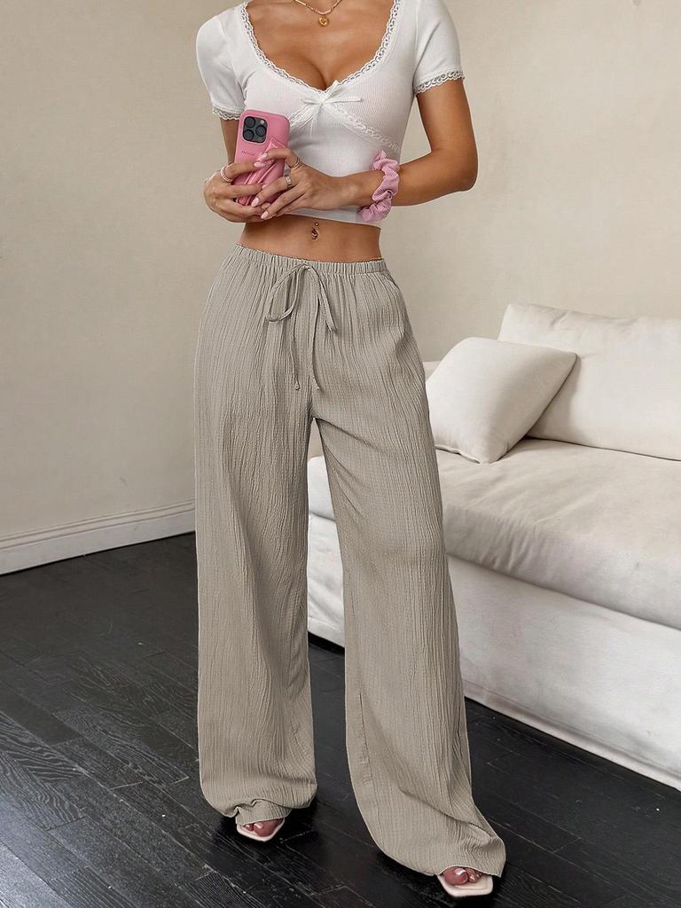 2026 Women's Casual Wide-Leg Pants with Knot Waist and Textured Fabric