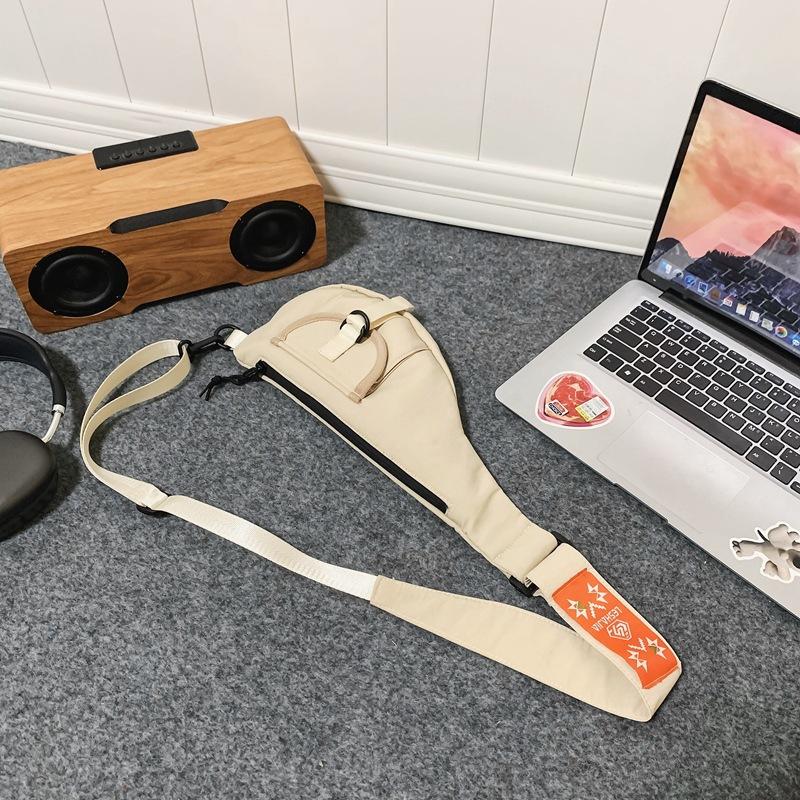 

Korean version of casual messenger small bag 2025 new simple breast bag nylon cloth shoulder bag couple backpack