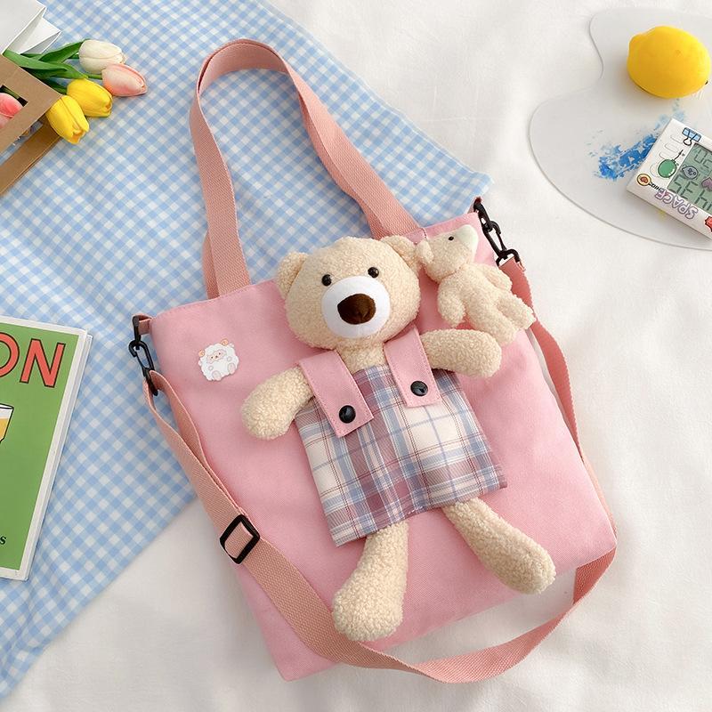 Broken color clearance Korean version shoulder bag women's niche casual cloth bag bear canvas bag female student class bag messenger bag