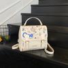 Korean version of college style cute cartoon printed handbag women 2025 new fashion casual backpack student schoolbag