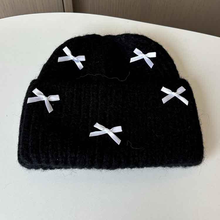 Wool hat women's autumn and winter new bow knitted hat shows a small face, warm ears, bag head, all-match cold hat