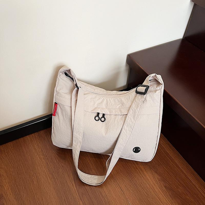 

Large capacity nylon bag women s new casual spring and summer messenger bag light travel commuter shoulder bag