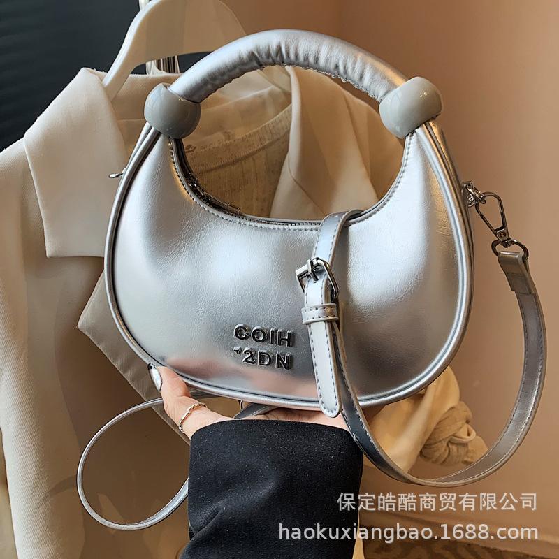 Super fire niche dumpling bag 2025 new spring and summer versatile shoulder messenger bag exquisite mini portable small bag