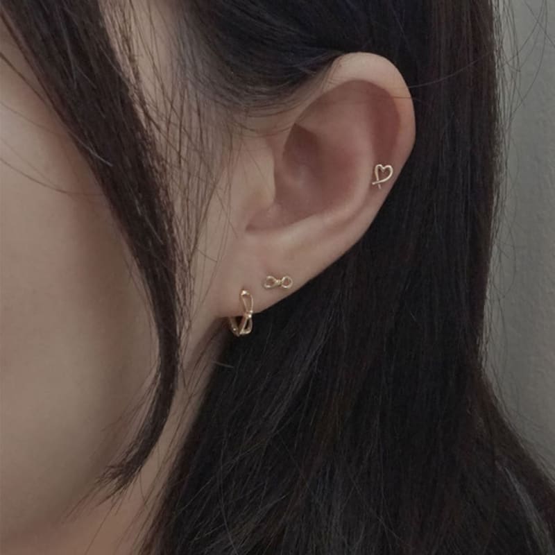 youngglow 14k infinity knot piercing