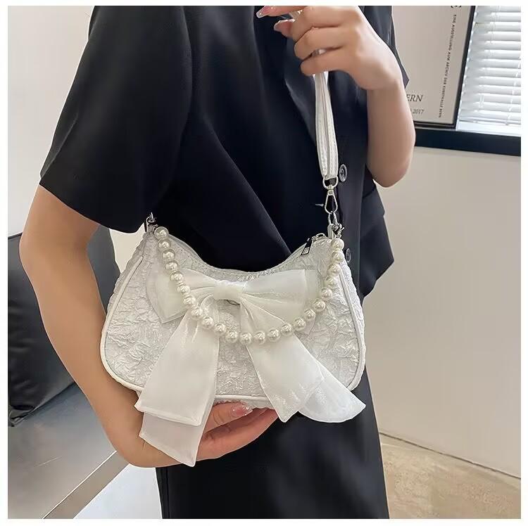 Niche design sweet style bow underarm bag women's summer 2025 new trendy fashion versatile shoulder bag women