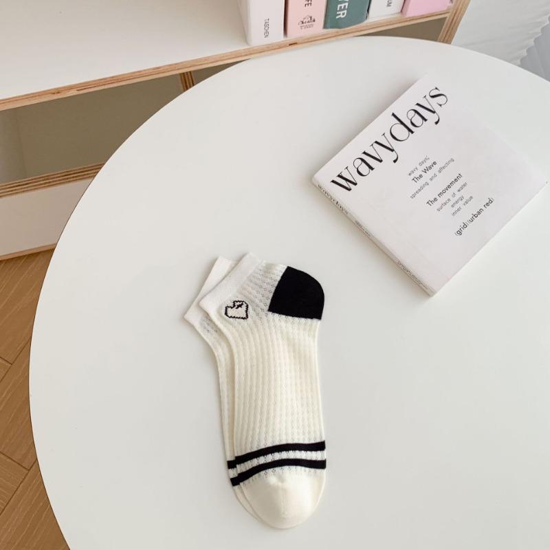 A Woman Wearing Summer Mesh Black and White Simple Embroidered Lettering Ultra-thin and Breathable Short Socks
