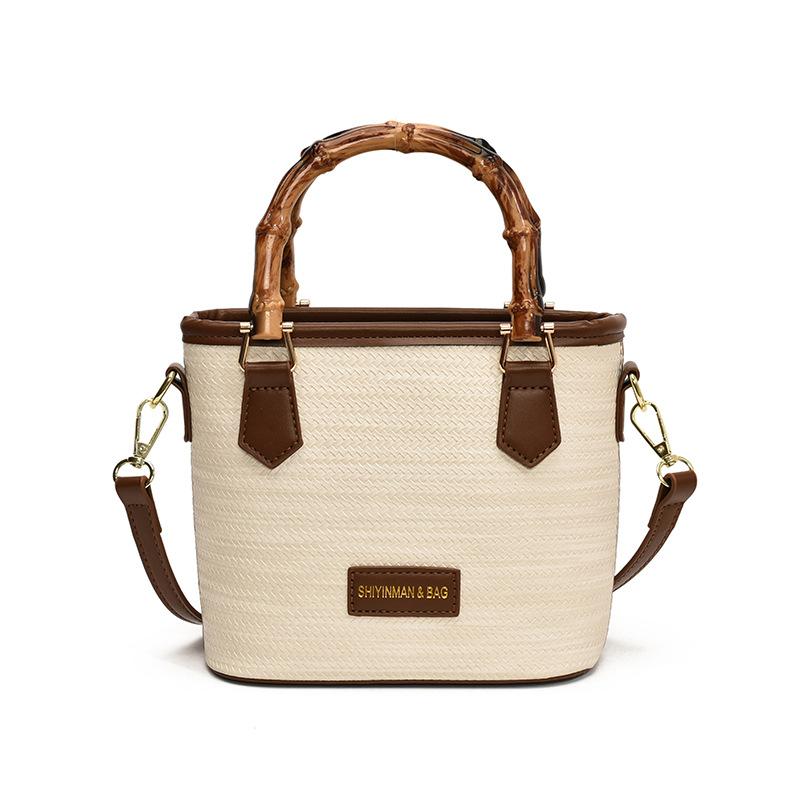 

Hand bag, small bucket bag, women s new simple and advanced sense, versatile shoulder bag, niche messenger straw bag белый