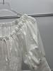 Elegant French Niche Spring Outfit: Puff Sleeve Drawstring Top & Skirt Set