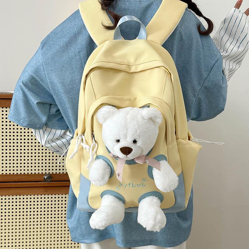 Boneca de urso feia fofa engraçada mochila versátil para estudante do ensino fundamental alto valor desenho animado fofa menina mochila de viagem