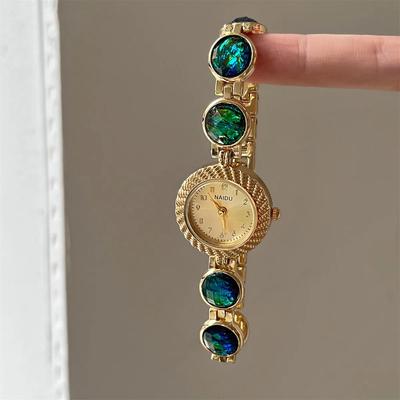 Orologio da polso da donna vintage rotondo con bracciale al quarzo