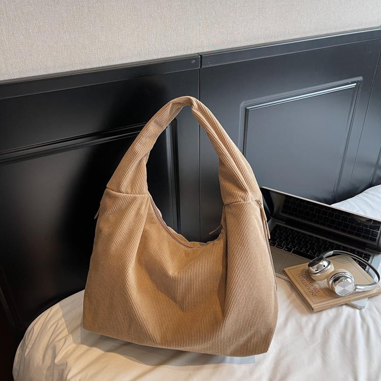 

Korean casual large-capacity canvas bag women s 2025 new lazy style literary underarm tote bag commuter shoulder bag хаки