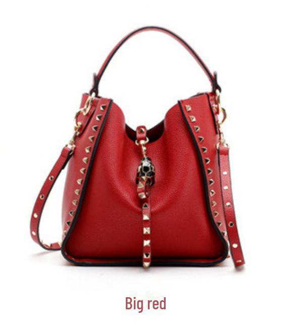 Women's Retro Rivet Cowhide Bucket Bag with Leopard Head Design