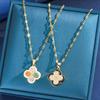 Women's Rotating Four-Leaf Clover Necklace with Colorful Zircon – Elegant Light Luxury Design