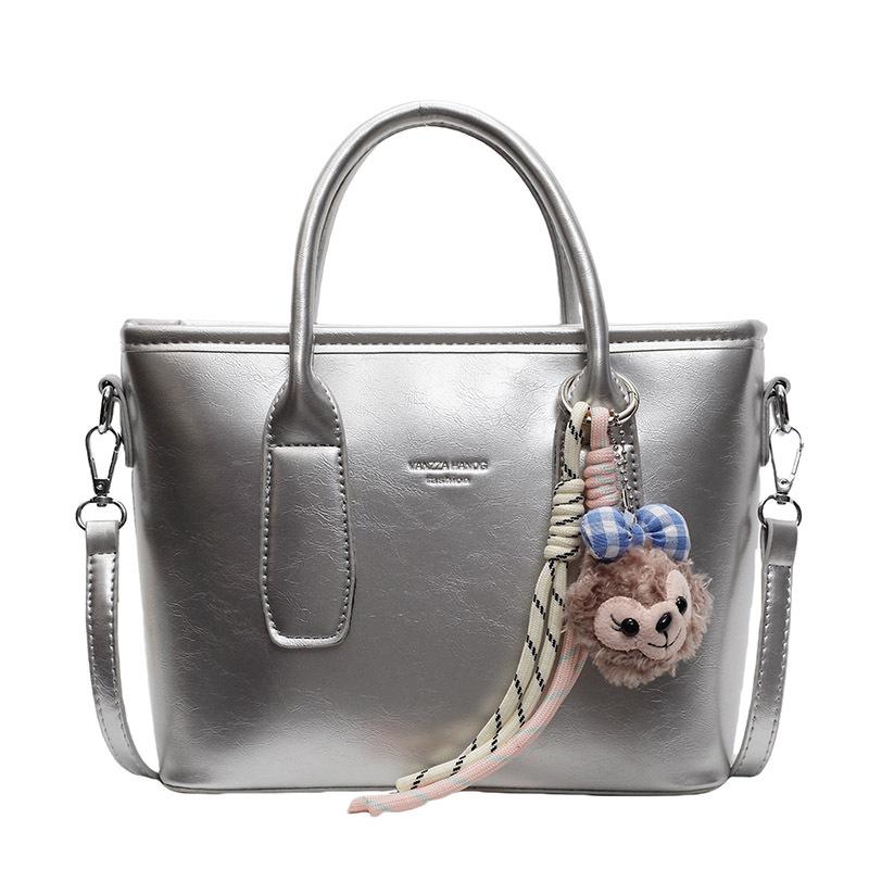 New High-end Korean Version Hugh Simple Portable Bucket Bag Versatile Commuter Fashion Niche Messenger Bag Bag Woman